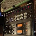 Audio rack featuring Distressor units and Klark Teknik limiting amplifiers at Somni Studios.