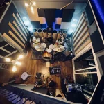 Overhead view of Somni Studios drum room with full mic setup for recording.