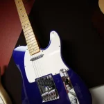 Fender Telecaster electric guitar in metallic blue finish at Somni Studios.