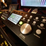 Grace Design m905 monitor controller with precision metering and volume control at Somni Studios.