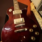 Gibson-style Les Paul electric guitar with mahogany finish at Somni Studios.