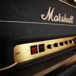 Marshall JMP amplifier head with gold panel at Somni Studios.