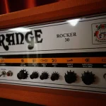 Orange Rocker 30 amplifier head with signature orange finish at Somni Studios.